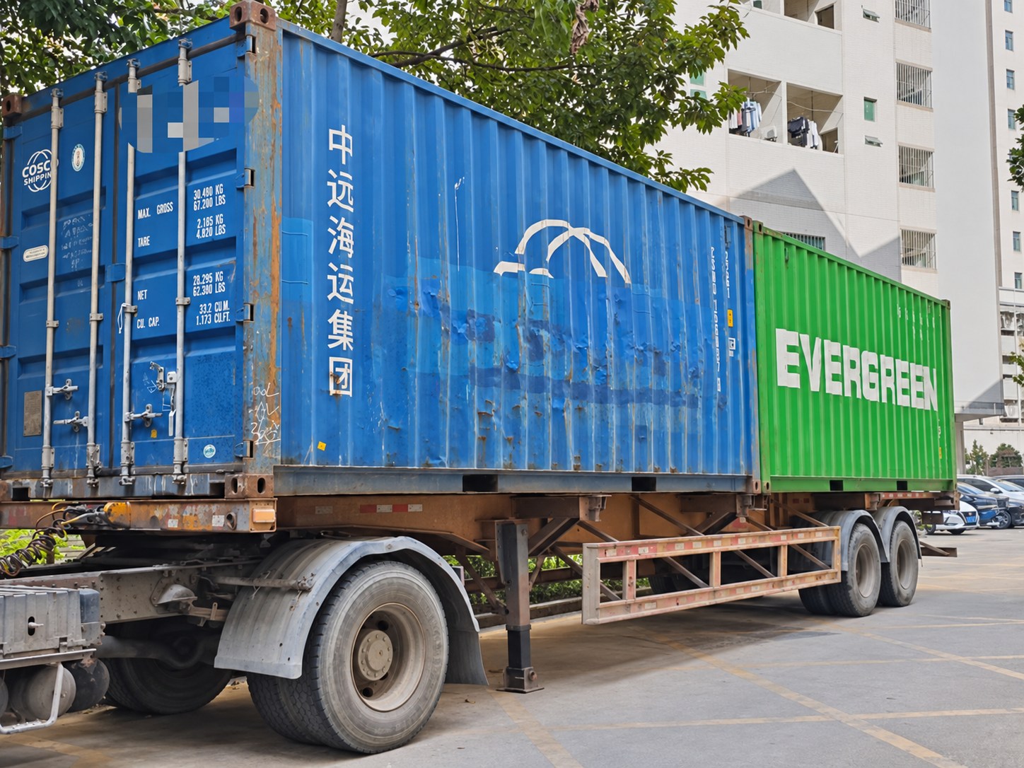 Shipping containers prepared for a bulk monitor export order